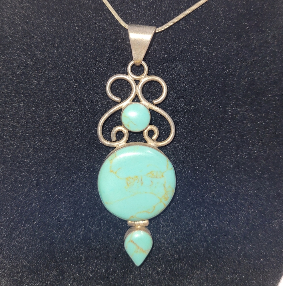 Elegant Silver and Turquoise Pendant Necklace